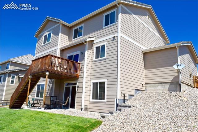 847 Spectrum Loop Colorado Springs, CO 80921 - Photo 3 of 22 Only four years old, this home has a deck and a patio for entertaining