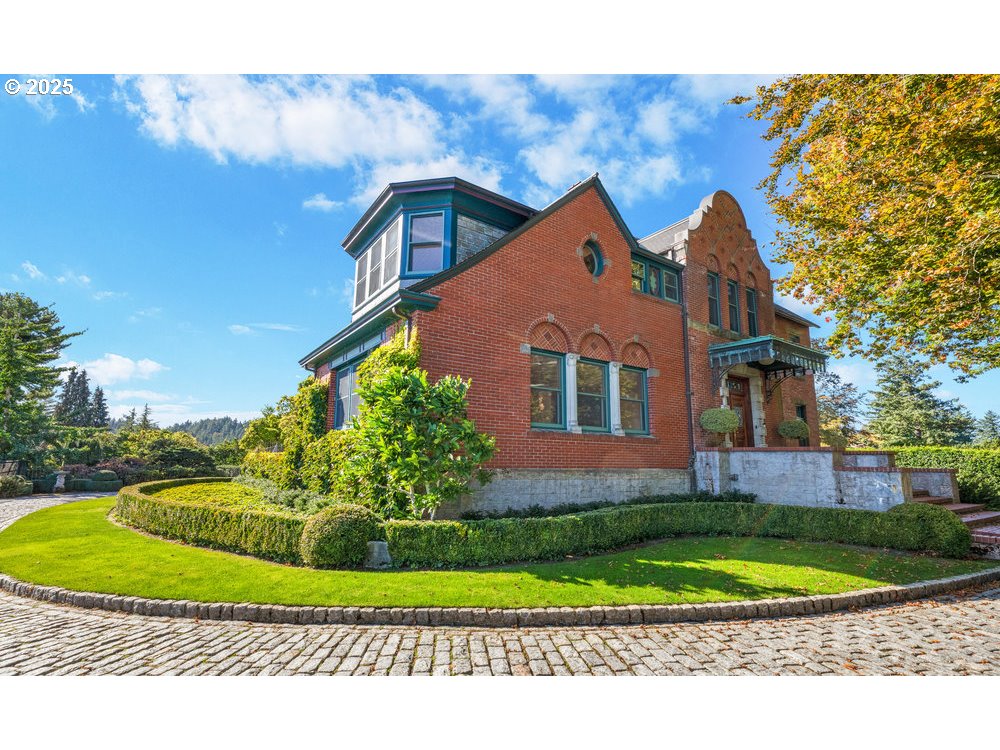 1816 Southwest Hawthorne Terrace Portland, OR 97201 - Photo 11 of 48 a front view of a house with a yard