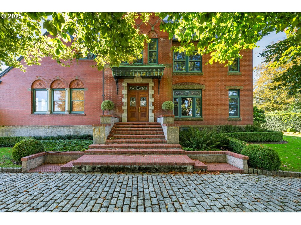 1816 Southwest Hawthorne Terrace Portland, OR 97201 - Photo 12 of 48 a front view of a house with a yard