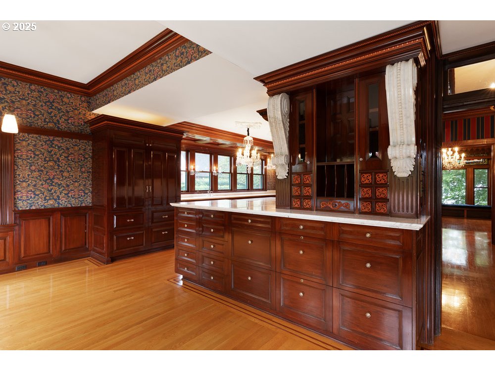 1816 Southwest Hawthorne Terrace Portland, OR 97201 - Photo 28 of 48 a living room with wooden cabinets and a dresser