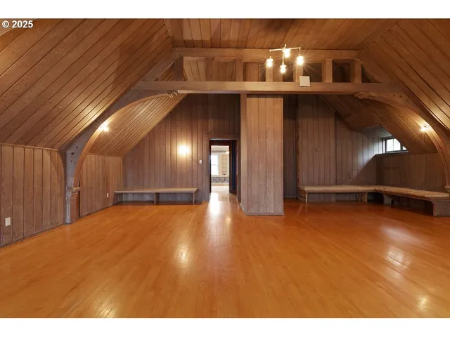 a sign board with yard in the back