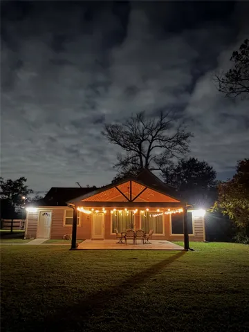 a view of a big building with big yard