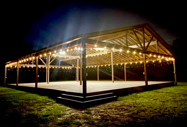 a view of a swimming pool with an outdoor seating