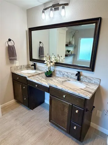 a bathroom with a tub and a shower