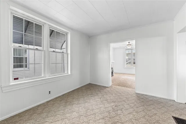 an empty room with windows