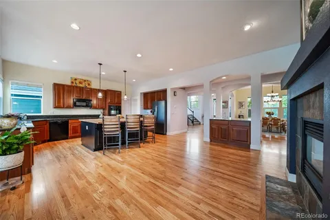 a view of a dining room with furniture and window