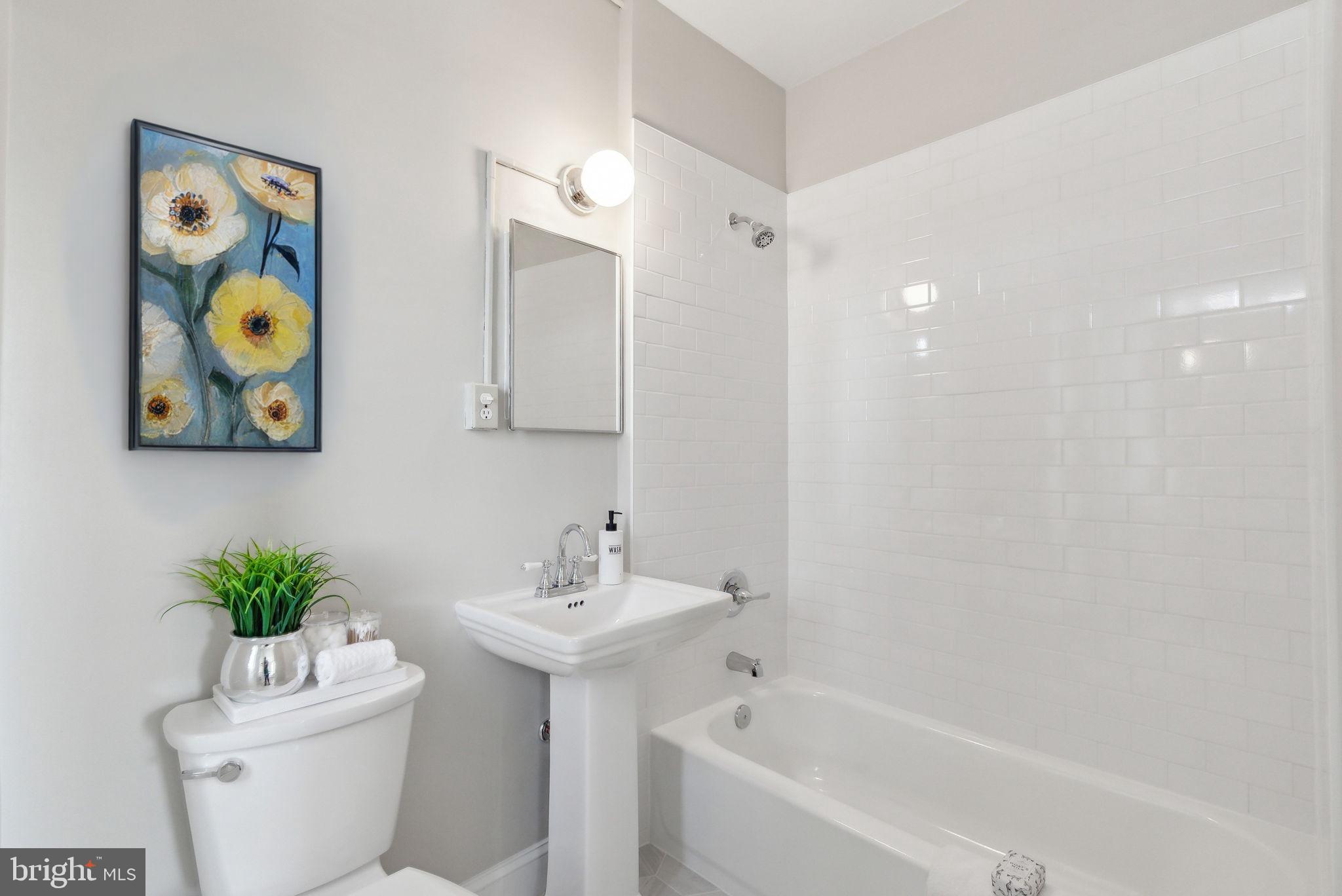 1954 Columbia Road Northwest, Unit 812 Washington, DC 20009 - Photo 9 of 14 NEWLY renovated full bathroom