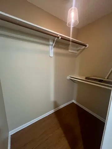 a view of a room with racks on the wall