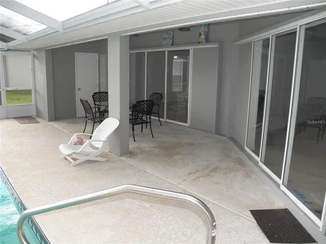 a room with table and chairs