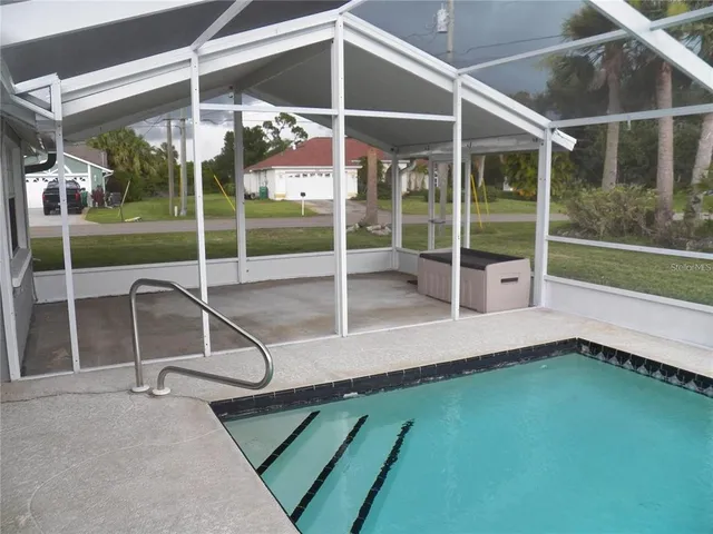 a room with lots of green space