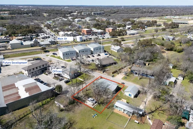 an aerial view of a city with lots of residential buildings