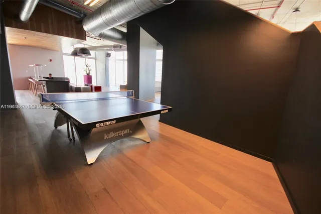 a room with table and chairs