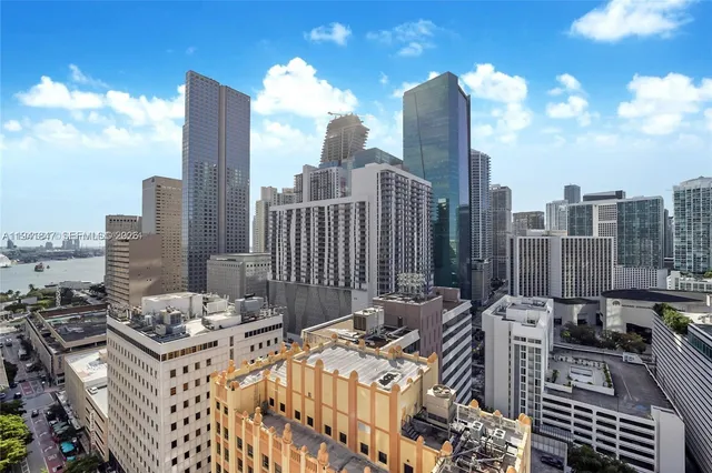 a view of a city with tall buildings