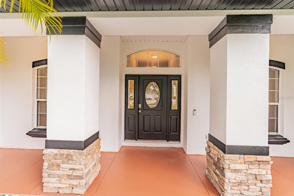 1670 Taylor Ridge Loop Kissimmee, FL 34744 - Photo 3 of 36 a view of front door of house