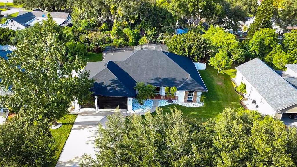1670 Taylor Ridge Loop Kissimmee, FL 34744 - Photo 34 of 36 an aerial view of a house with swimming pool and garden