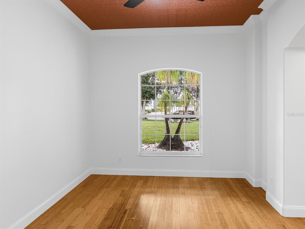 1670 Taylor Ridge Loop Kissimmee, FL 34744 - Photo 7 of 36 an empty room with a window
