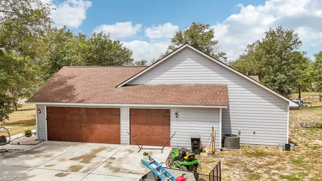 a view of a yard with an outdoor space