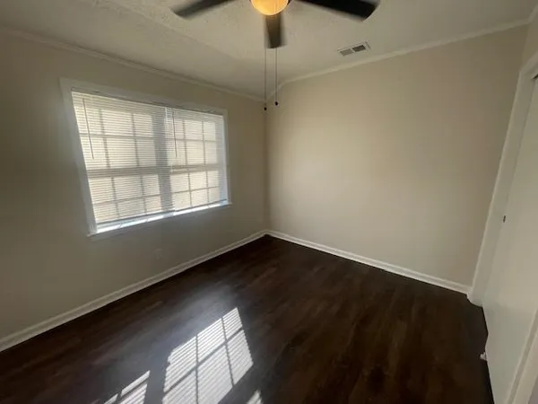 a view of an empty room with window