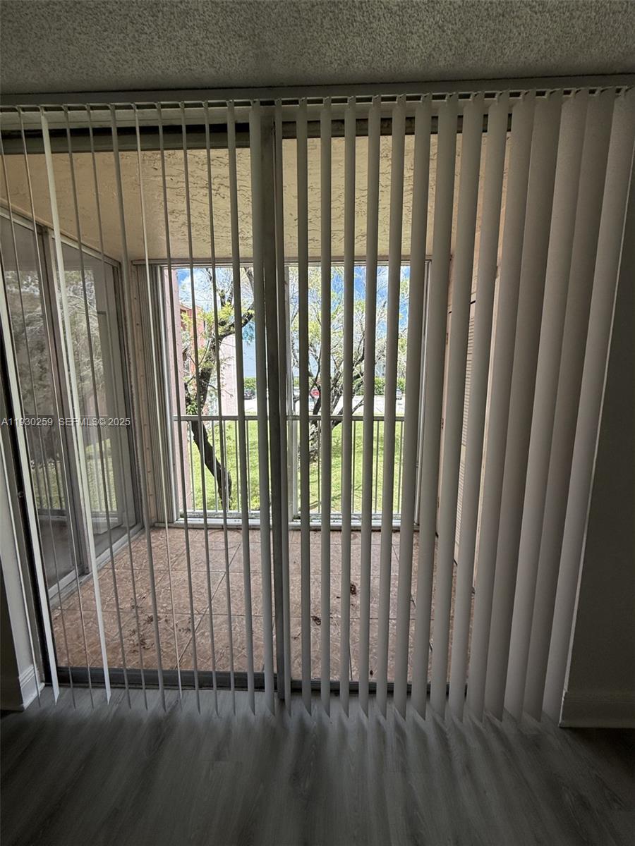 19729 Southwest 114th Avenue, Unit 251 Miami, FL 33157 - Photo 9 of 10 a view of a black gate