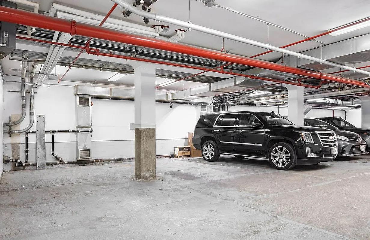 60 Collister Street, Unit PH5B Manhattan, NY 10013 - Photo 12 of 23 a view of parking garage with cars