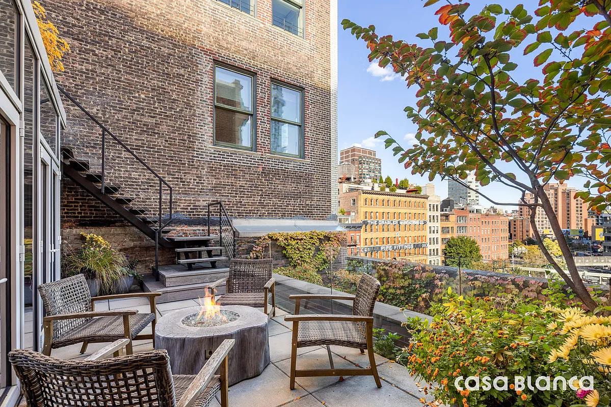 60 Collister Street, Unit PH5B Manhattan, NY 10013 - Photo 20 of 23 a view of a chairs and table in a patio