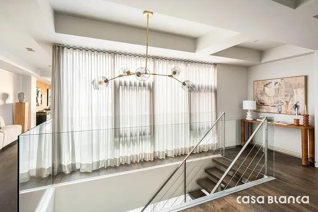 a view of a chairs and table in a patio