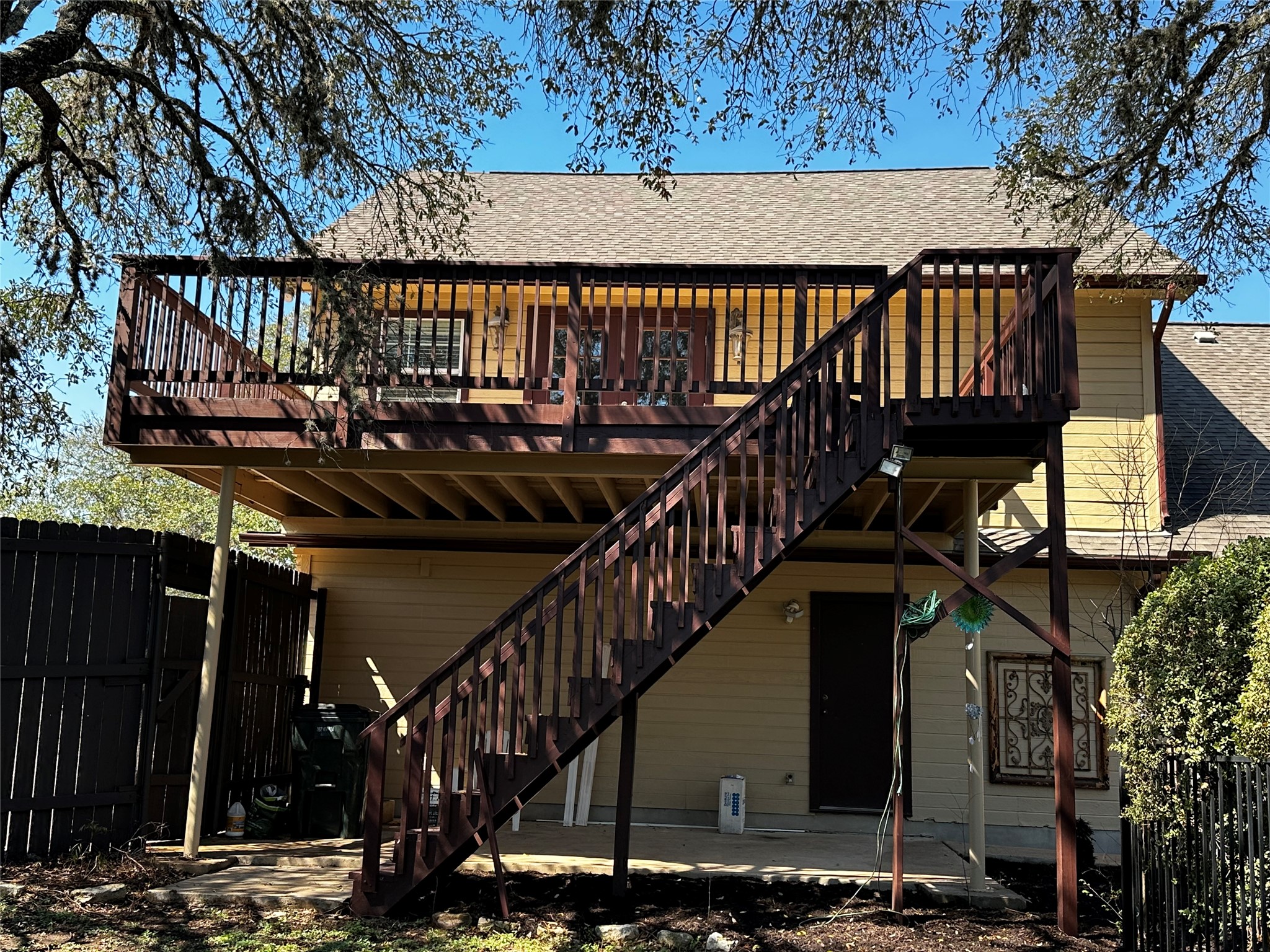13615 Copperleaf Trail Manchaca, TX 78652 - Photo 32 of 39 Back of house with a wooden deck and roof with shingles