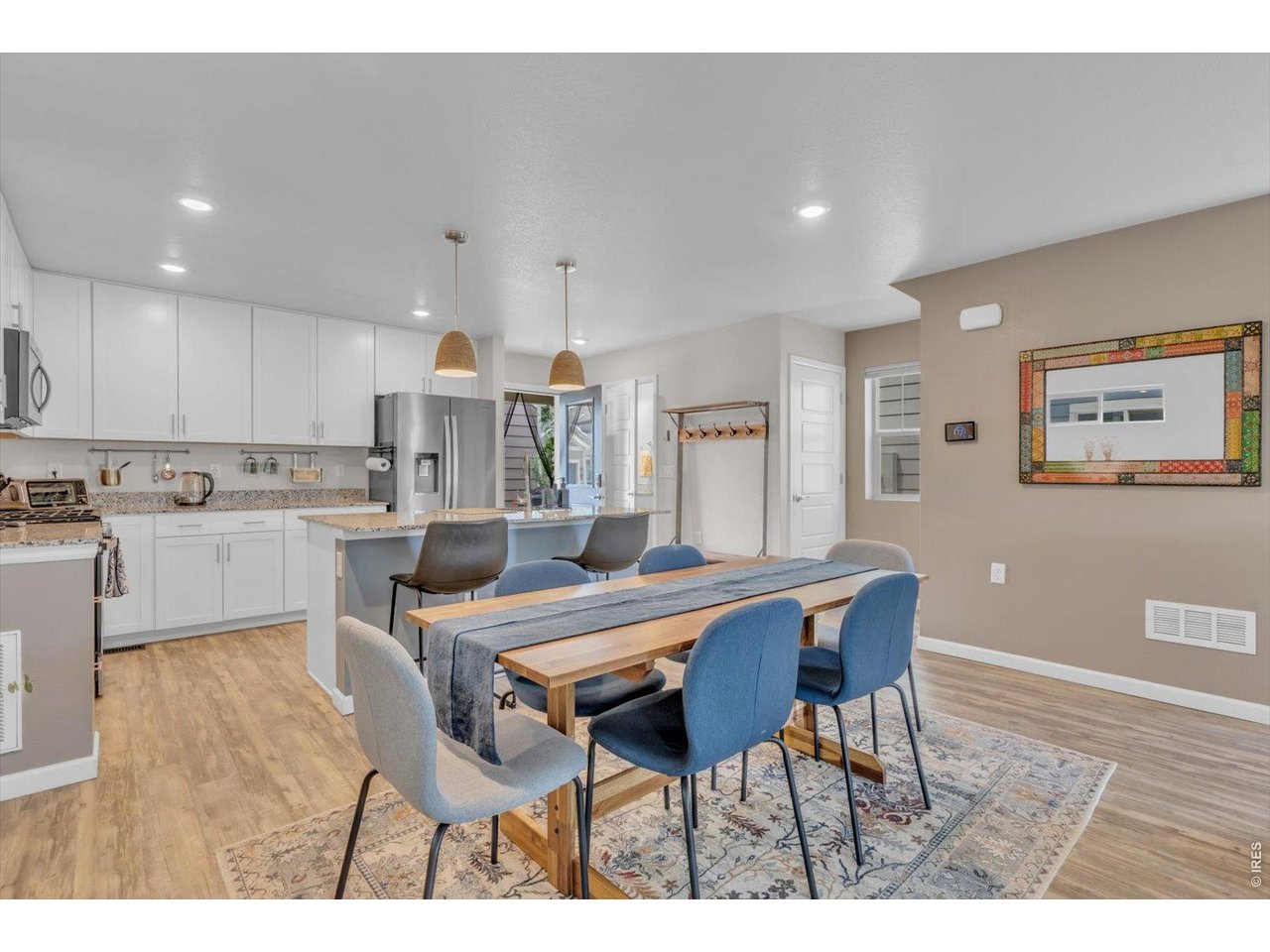 69 Quail Road Longmont, CO 80501 - Photo 8 of 25 Spacious dining area, seating for 6 and 2 more bar stools...fun for entertaining!