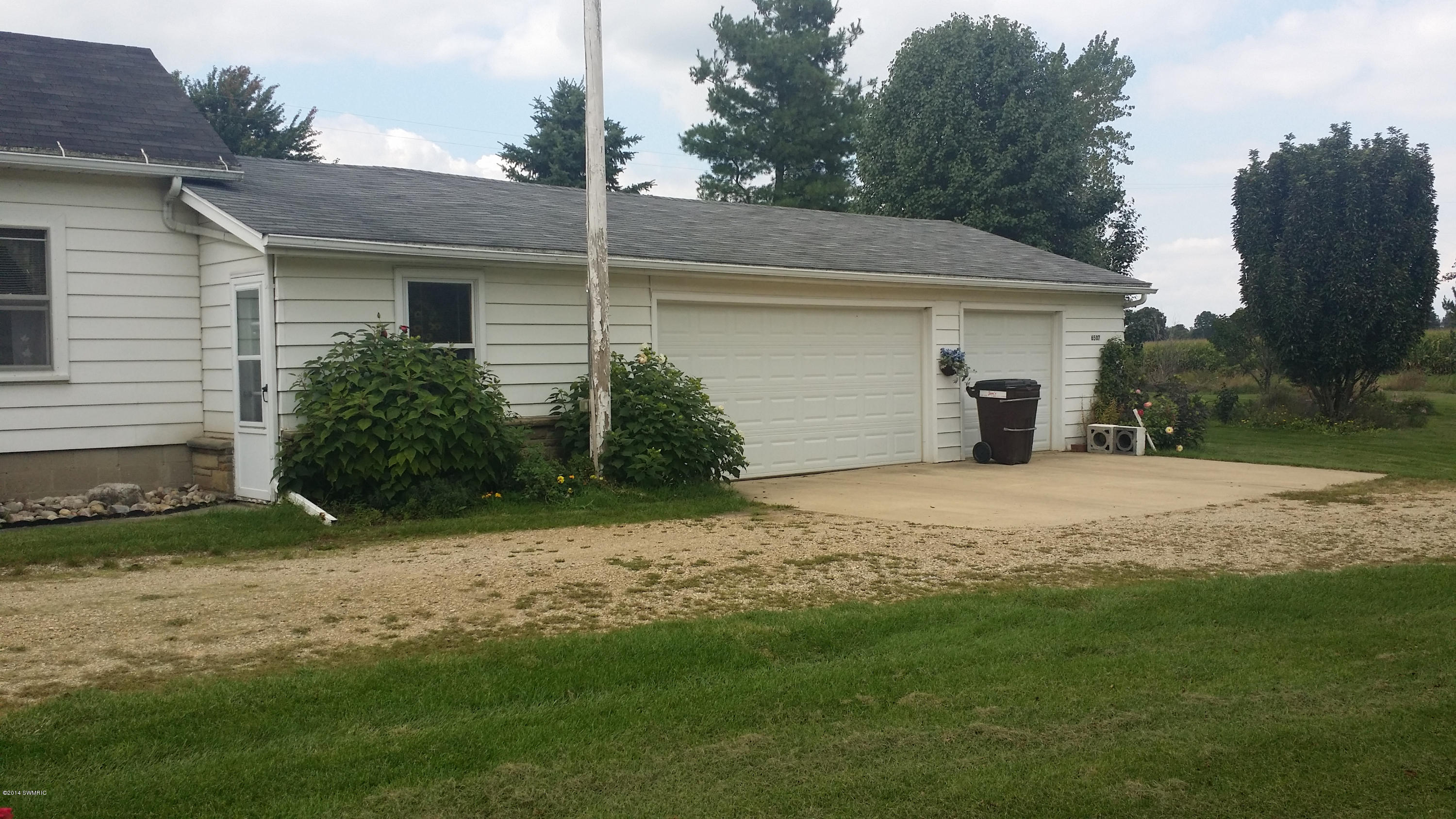 6507 Duncan Lake Road Middleville, MI 49333 - Photo 2 of 3 Three and half stall garage