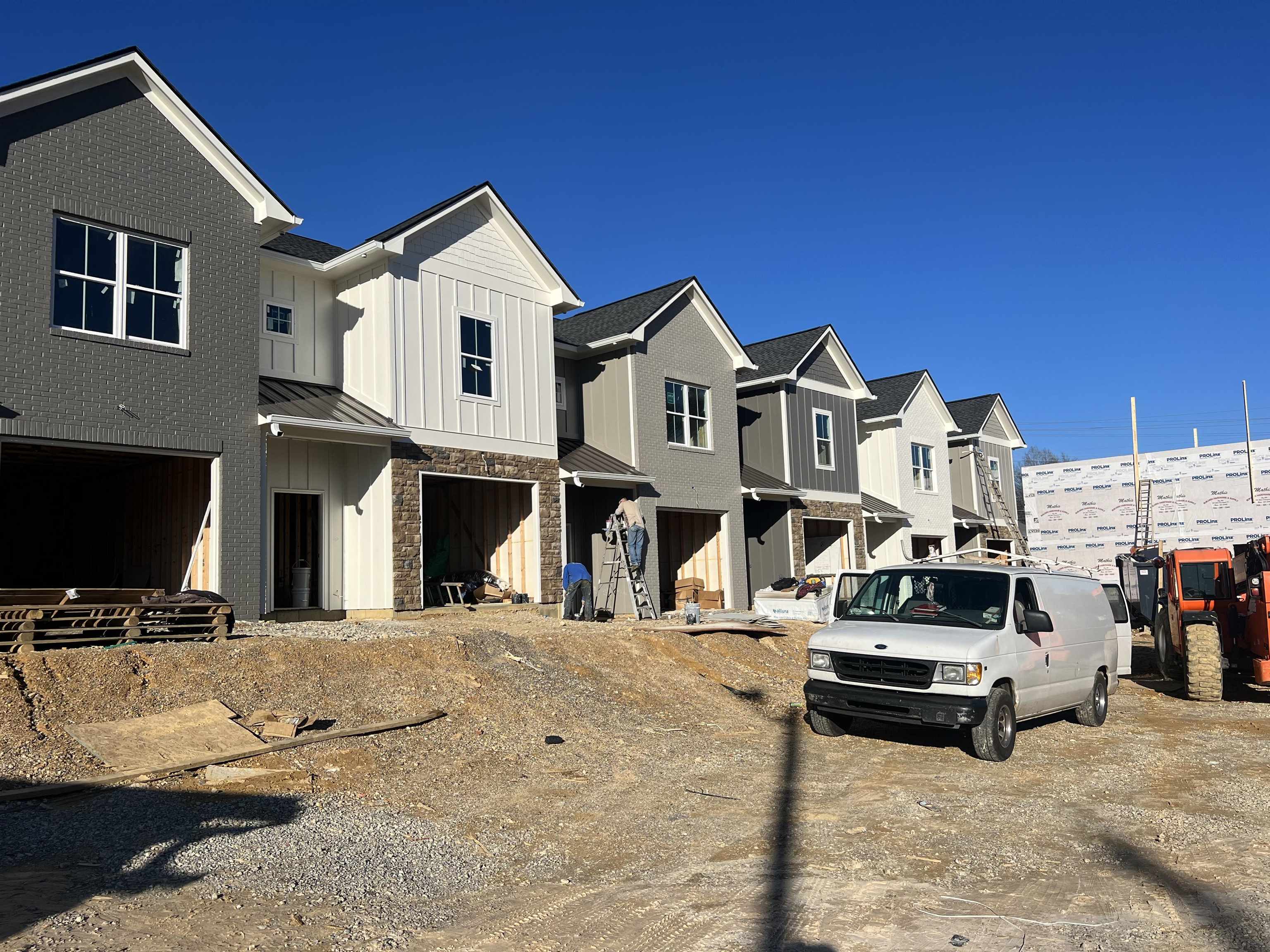 643 East 3rd Street, Unit 20 Rome, GA 30161 - Photo 1 of 1 a view of a white house with a large windows and a yard