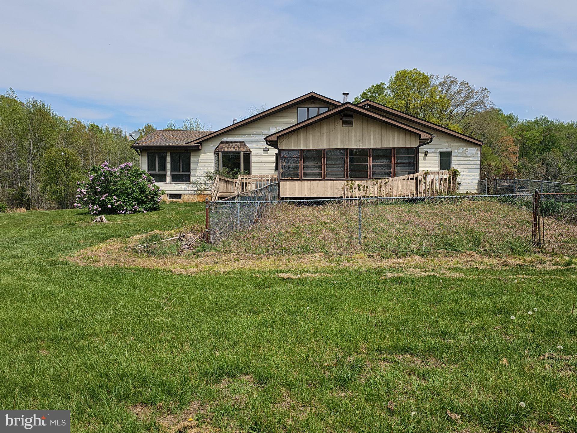 911 Gum Tree Corner Road Greenwich, NJ 08323 - Photo 6 of 47 a front view of house with yard and green space