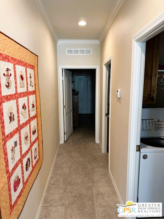 17640 Corkill Road, Unit 37 Desert Hot Springs, CA 92241 - Photo 13 of 35 a view of hallway with stairs and a furniture