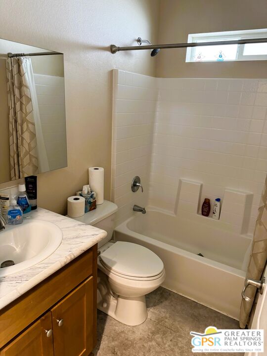 17640 Corkill Road, Unit 37 Desert Hot Springs, CA 92241 - Photo 21 of 35 a bathroom with a sink a toilet and shower
