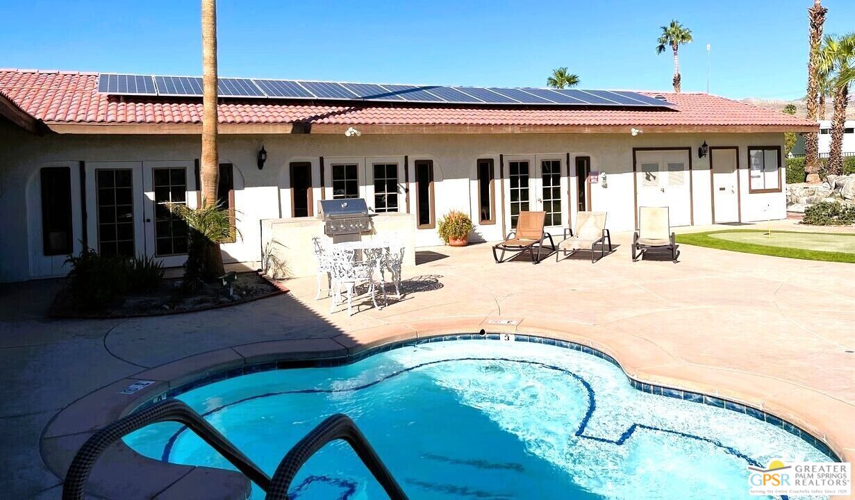 17640 Corkill Road, Unit 37 Desert Hot Springs, CA 92241 - Photo 24 of 35 a view of a house with patio