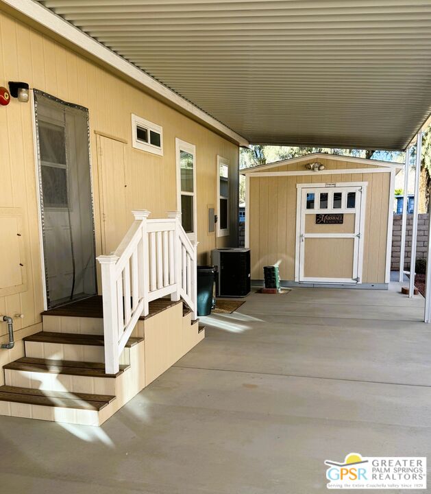 17640 Corkill Road, Unit 37 Desert Hot Springs, CA 92241 - Photo 5 of 35 a view of a house with a outdoor space