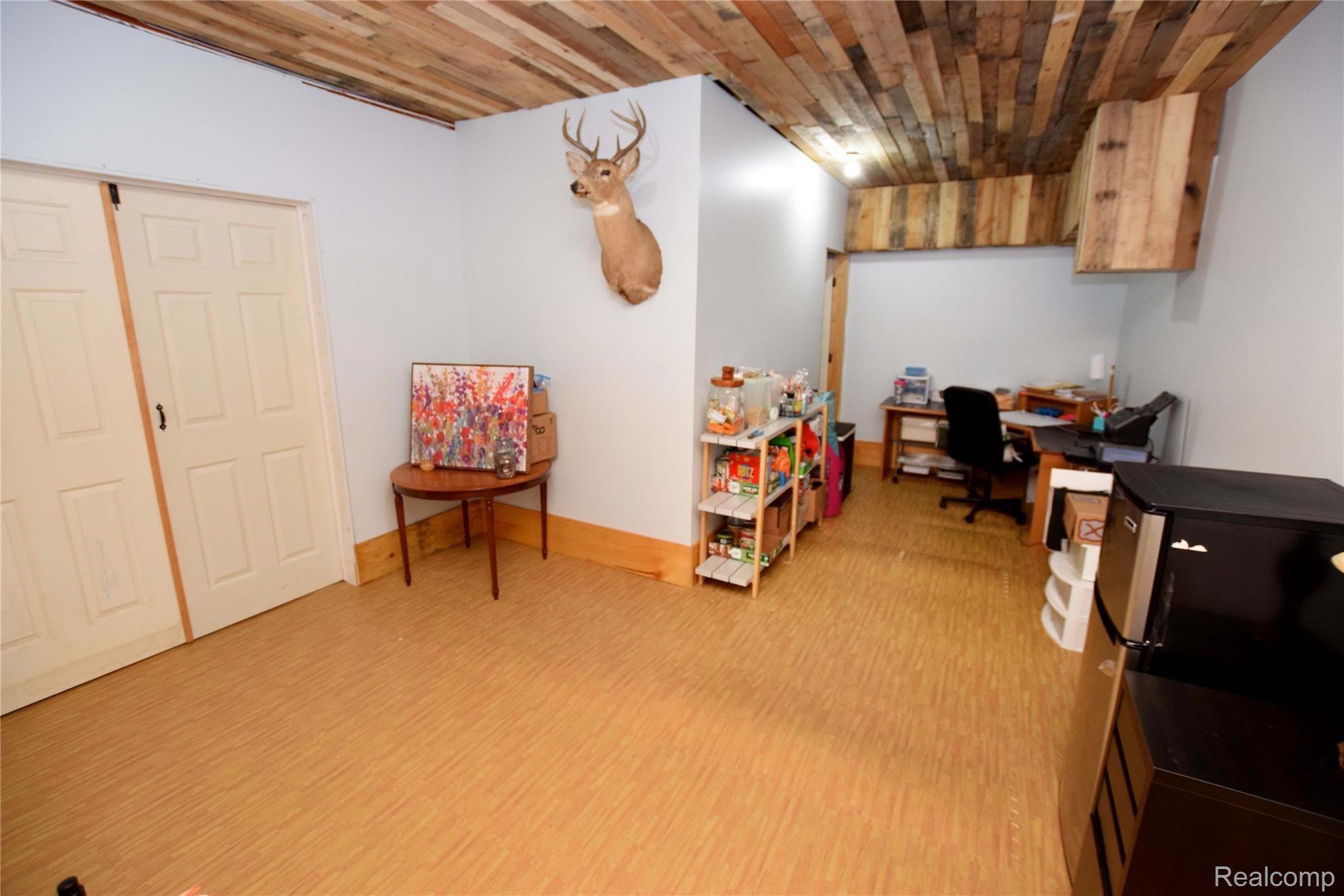 6507 Carpenter Road Flushing, MI 48433 - Photo 18 of 25 Finished Lower Level.JPG