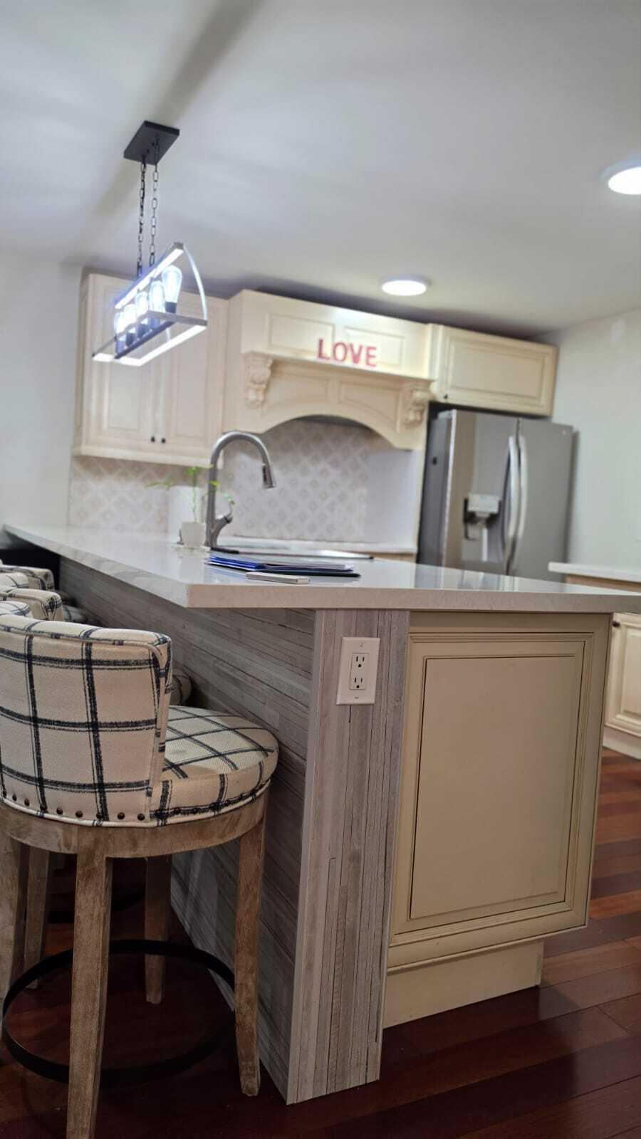 100 Ashbury Road, Unit 206 Hollywood, FL 33024 - Photo 6 of 23 a kitchen with a sink a stove and cabinets