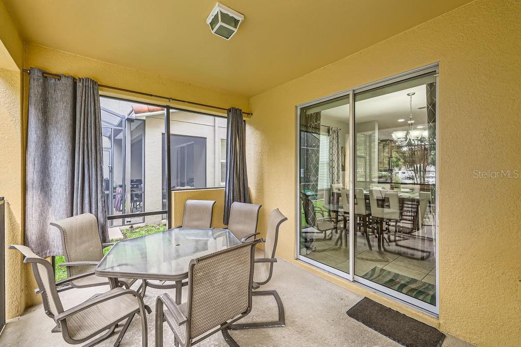 8989 Cuban Palm Road Kissimmee, FL 34747 - Photo 31 of 49 a dining room with furniture and window