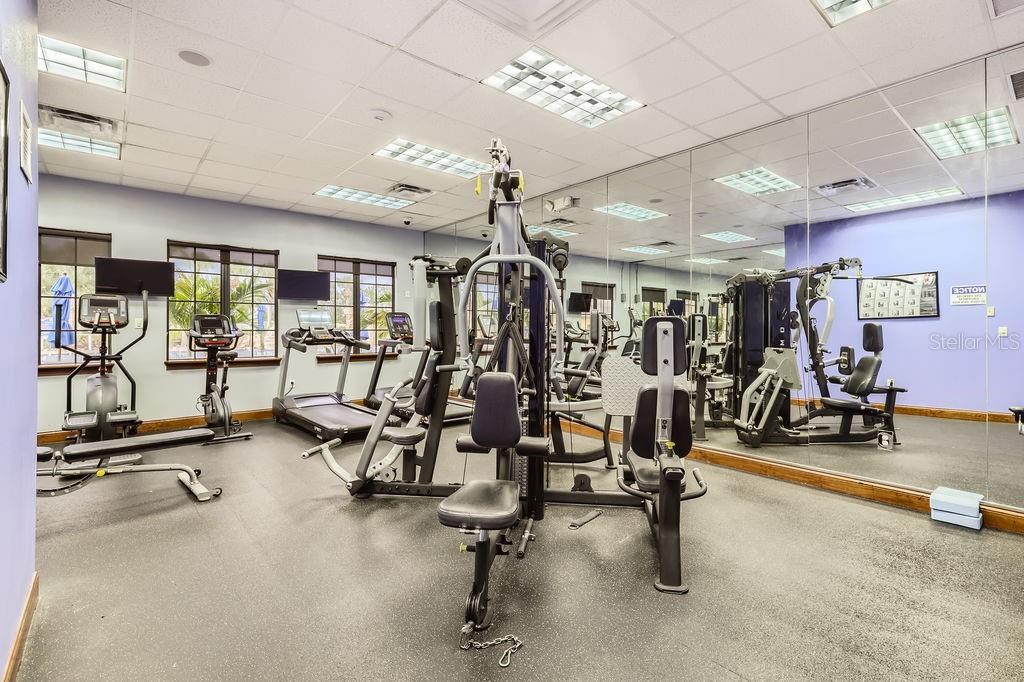 8989 Cuban Palm Road Kissimmee, FL 34747 - Photo 37 of 49 a view of a room with gym equipment