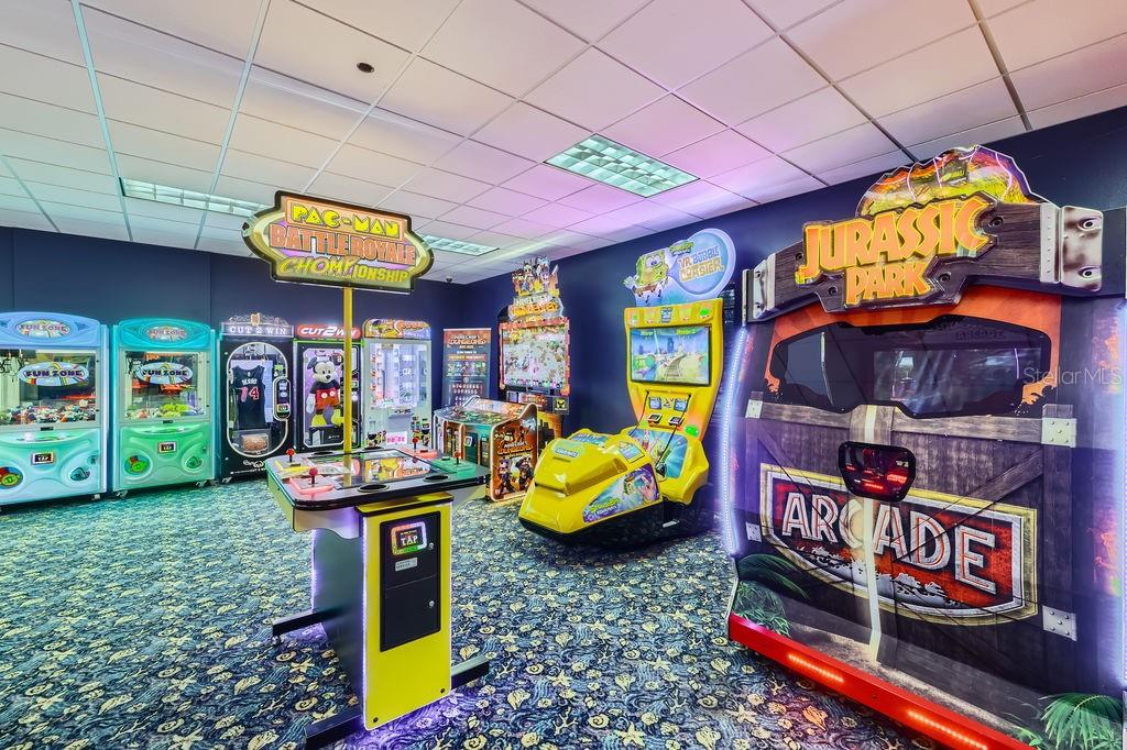 8989 Cuban Palm Road Kissimmee, FL 34747 - Photo 40 of 49 a front view of a multi story building with yard