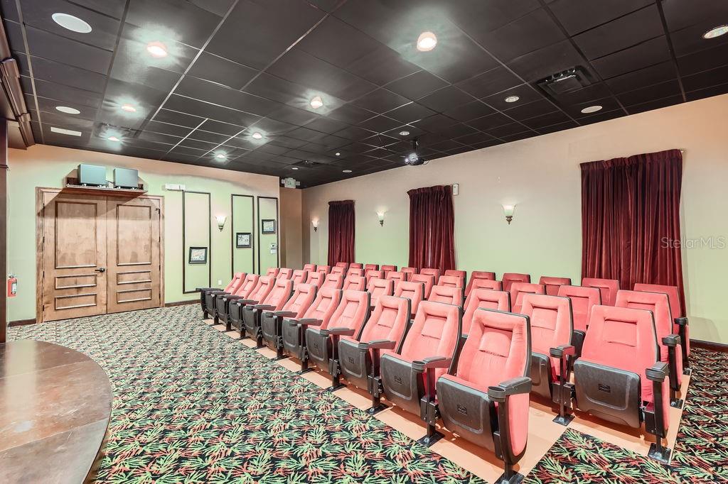 8989 Cuban Palm Road Kissimmee, FL 34747 - Photo 42 of 49 a spacious bedroom with a bed and wooden floor