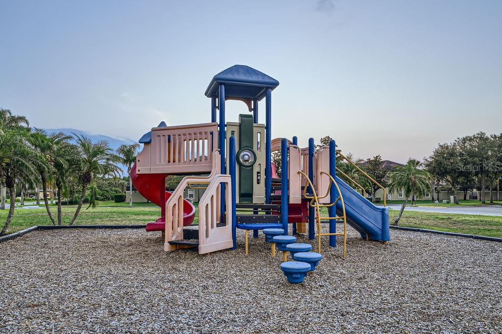 8989 Cuban Palm Road Kissimmee, FL 34747 - Photo 44 of 49 a view of outdoor space with garden and entertaining space