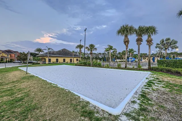 a view of a swimming pool and a yard