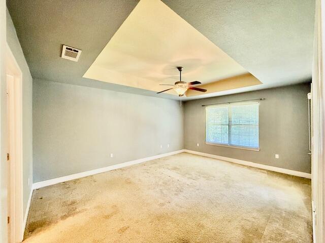 222 Raptor Drive Crestview, FL 32536 - Photo 17 of 42 an empty room with a ceiling fan and window