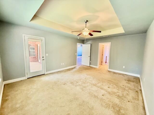 222 Raptor Drive Crestview, FL 32536 - Photo 18 of 42 an empty room with a ceiling fan and window