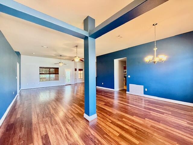222 Raptor Drive Crestview, FL 32536 - Photo 3 of 42 a view of empty room with wooden floor