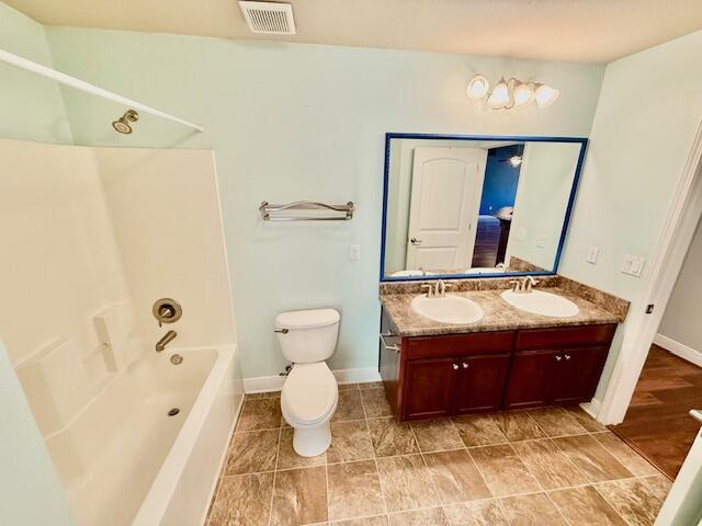 222 Raptor Drive Crestview, FL 32536 - Photo 36 of 42 a bathroom with a sink and a mirror