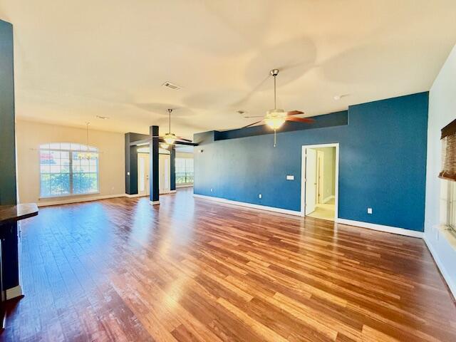 222 Raptor Drive Crestview, FL 32536 - Photo 4 of 42 a view of a kitchen with furniture and wooden floor