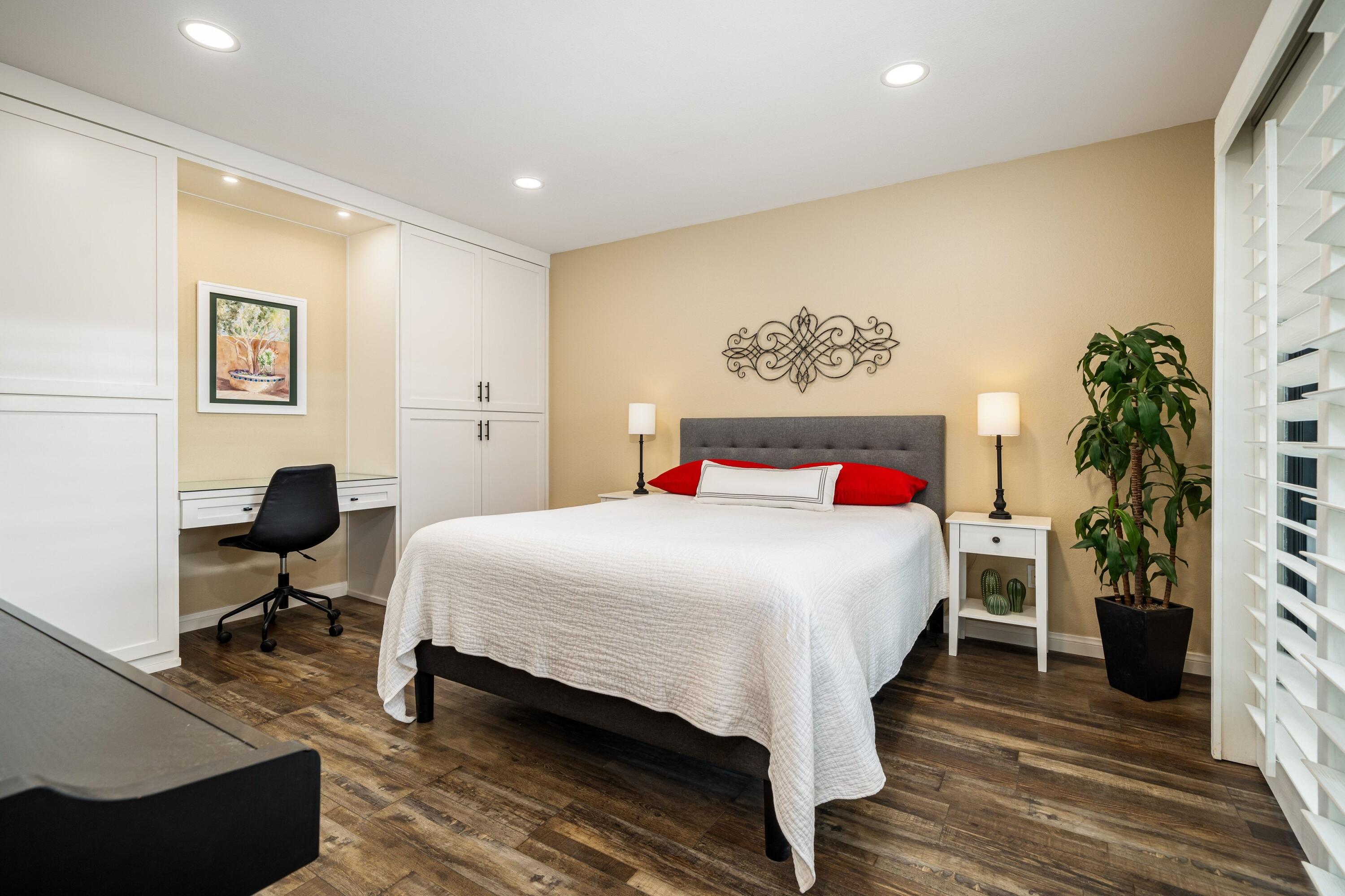 29 Verde Way Palm Desert, CA 92260 - Photo 18 of 43 a bedroom with a bed and a desk