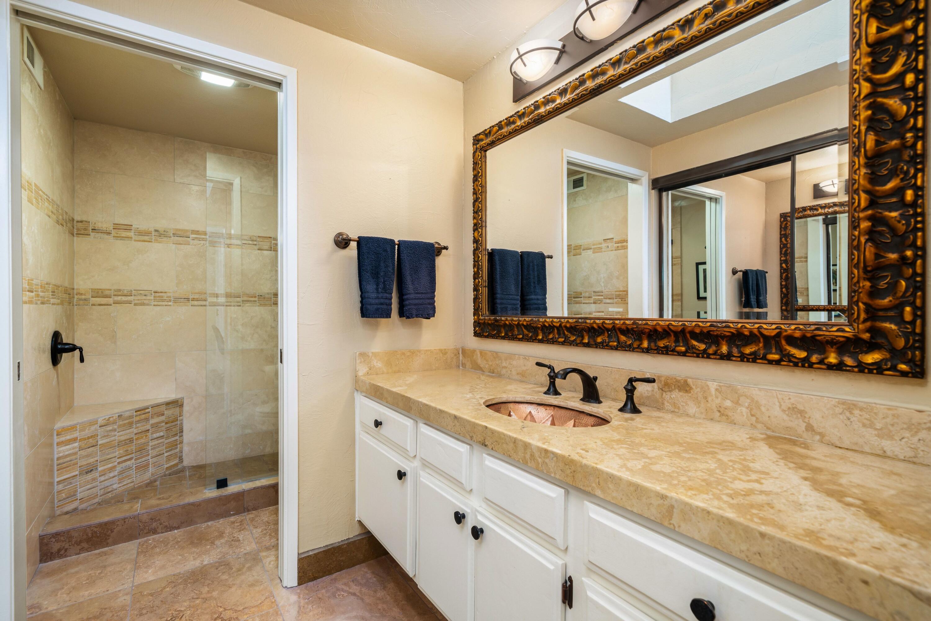 29 Verde Way Palm Desert, CA 92260 - Photo 21 of 43 a bathroom with a double vanity sink and mirror